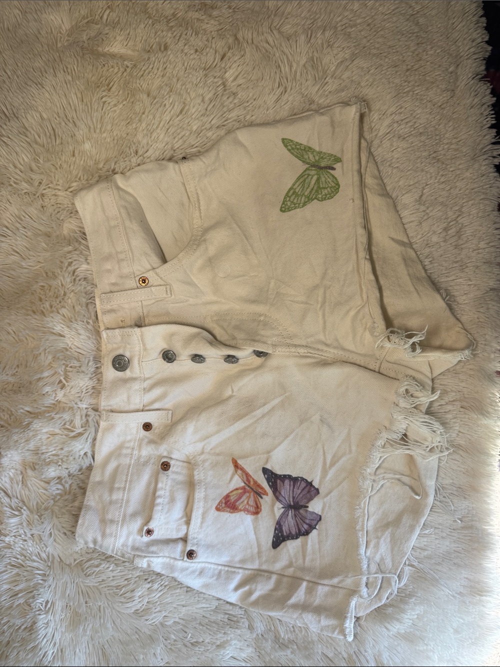 Levi's White Denim Frayed Hem Cutoff Shorts
